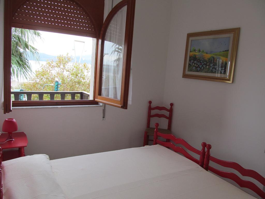 Apartamento Luci Del Golfo Alguer Habitación foto